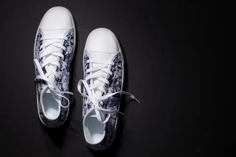 Rishon LeZion, Israel, September 13, 2021 - Close up shoe sneakers on black b Stock Photos
