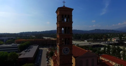Rising above a Church Clock Tower in Pasadena, CA. Stock Footage