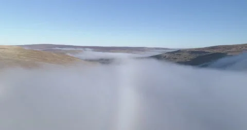 Rising above clouds Stock Footage 187894765