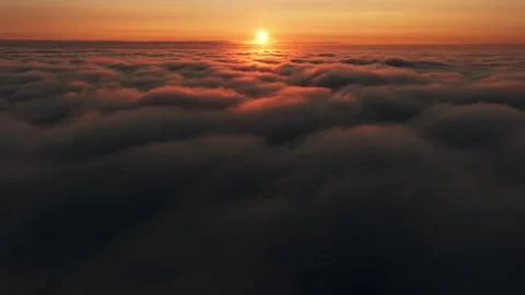 Rising above scenic clouds at sunset, aerial view Stock Footage 258270099