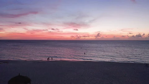 Rising Aerial of Eagle Beach in Aruba at Sunset Stock Footage 236406476