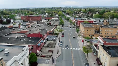 Rising aerial pullback revealing shot of Main Street in small American Stock-Footage 131064795
