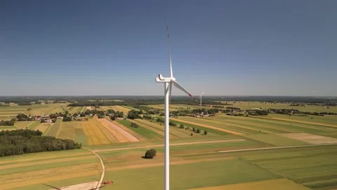 Rising Aerial Shot Toward Wind Turbine Stock Footage 337724904