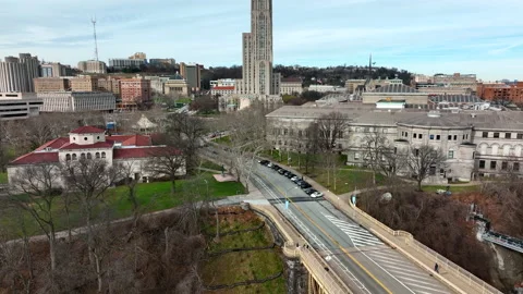 Rising aerial of University of Pittsburgh. Pitt Cathedral of Learning. Stock Footage