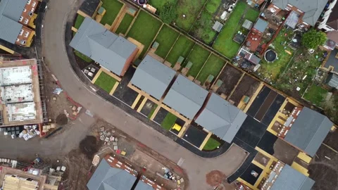 Rising aerial view of a housing development in the UK Video stock 192489715
