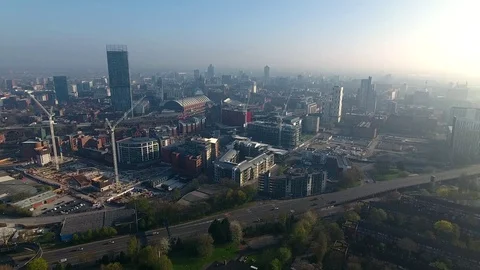 Rising aerial view of Manchester city centre, UK. Stock Footage