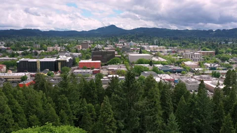 Rising aerial view revealing Eugene Oregon Stock Footage 130817296