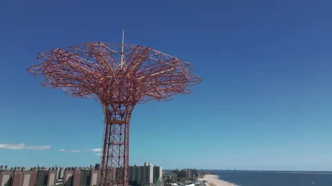 Rising and tilting down shot of iconic parachute jump tower of Coney Island Video stock 206897299