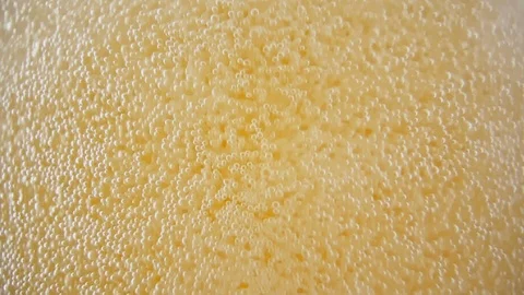 Rising Beer Bubbles - Close-up - Slow Motion Stock Footage 122675952