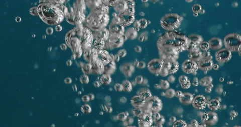 Rising Bubbles Created From Pouring Liquid Into Water Video stock 167376376