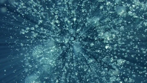 Rising bubbles with light reflections underwater, Indonesia Stock Footage 84929297