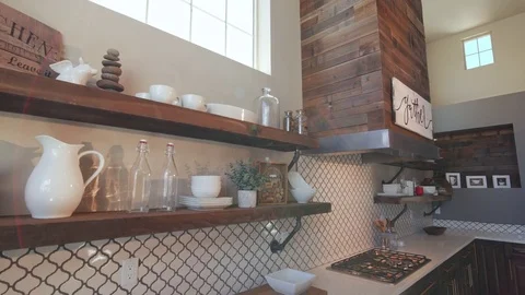 Rising Cabinet Corner of Modern Kitchen with Lens Flare Stock Footage 76255963