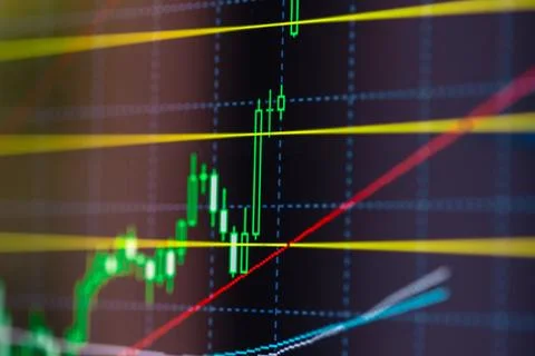 Rising candlestick chart on screen. Trading data and financial market movemen Stock Photos
