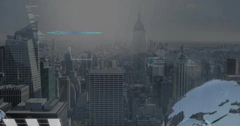 Rising central spired skyscraper towering over downtown rooftops, showing HVA Foto stock