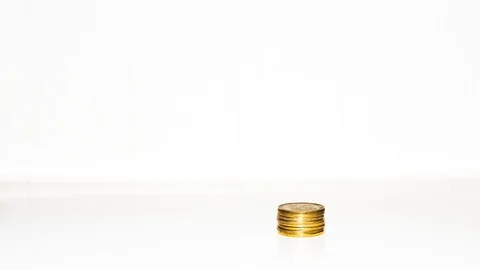 Rising columns of coins.Four stacks of copper coins build up. Like a bar graph Stockbeeldmateriaal 86711031