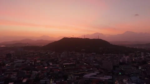 Rising Drone Aerial View Over Panama City Toward Ancon Hill at Colorful Sunset Видео 340035076
