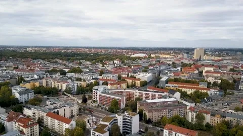 A rising drone shot of downtown Leipzig, Germany on a cloudy day Stock Footage 262034848