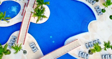 Rising Drone Shot of Empty Hotel Pool, Tropical Resort Stock Footage 116623597