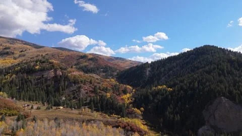 Rising drone shot of fall mountains Stock Footage 252568775