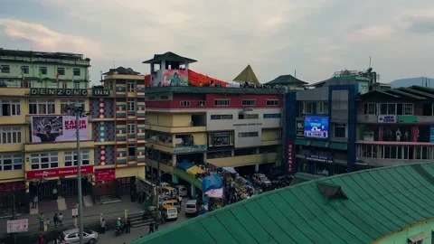 Rising Drone Shot Over Rooftop Event in Indian City Stock Footage 133336887