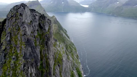Rising Drone Shot Revealing Segla Mountain Peak Above the Sea, Senja Norway Stock-Footage 321833085