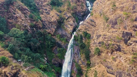 Rising Drone Shot of Spring Waterfall in Lamjung’s Himalayan– 4K Stock Footage 309836366