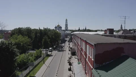Rising drone view over urban road and buildings Stock Footage 331740702