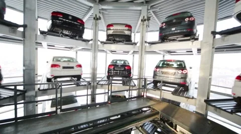 Rising empty elevator in modern glassy tower for car parking Stockbeeldmateriaal 40065740