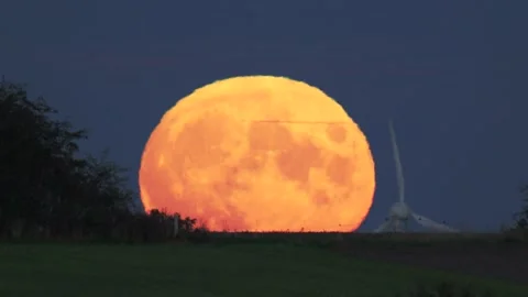 Rising full moon in germany | Stock Video | Pond5