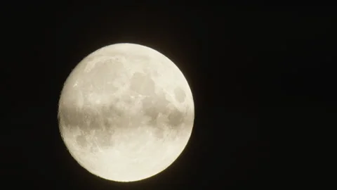 Rising Full Moon, Shadow Coming Through Moon Timelapse Stock Footage 254726386