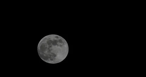 Rising Full moon - time lapse - fifteenfold 15x - 4K UHD stock video Stock Footage 86652943