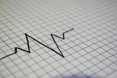 Rising Line Graph on Grid Paper – Business Growth and Financial Success Stock Photos