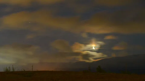 Rising Moon in Cloudy Sky Time-Lapse Stock Footage 25898780
