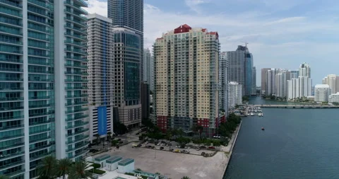 Rising over an empty lot on Biscayne Bay Stock Footage 197049789