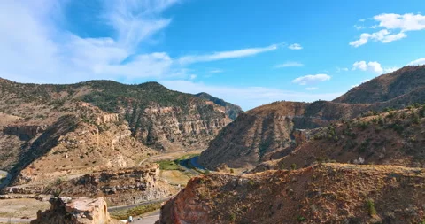 Rising over the jaw-dropping mountainous landscape of the Price Canyon, Utah Stock Footage 316970685