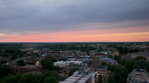 Rising up over Oxford Centre Sunset shot 25fps UK Видео 337959439