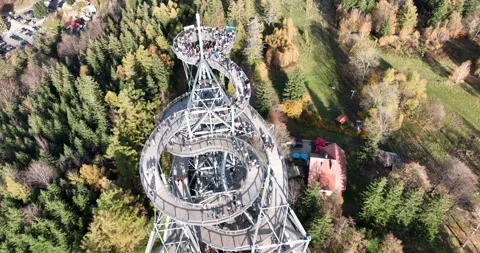 Rising over spiral observation tower in Świeradów-Zdrój in autumn Stock Footage 346662587
