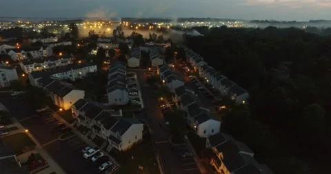 Rising up Over Subdivision During the Evening of the Fourth of July (Ultra HD) Stock Footage 52136120