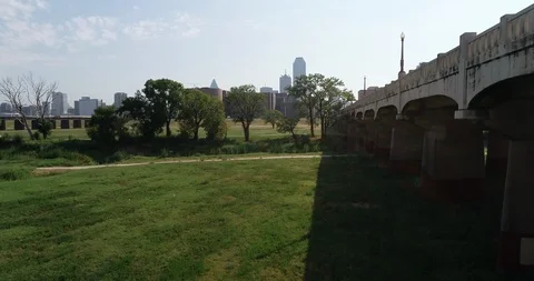 Rising over the Trinity River near downtown Dallas, Texas Stock Footage 121385528