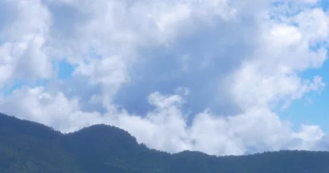 Rising Rain Clouds From The Tropical  Jungle Valleys Over High Mountain Peaks Stock Footage 137547534