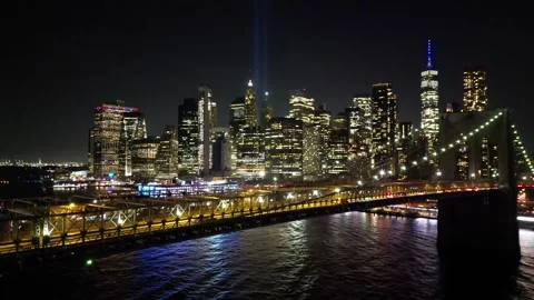 Rising shot from under Brooklyn Bridge New York revealing Manhattan Skyline NYC Stock Footage 253304865