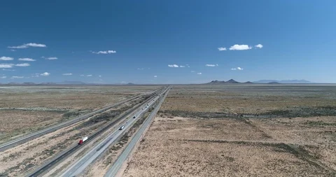 Rising up showing scale of interstate 10 with long straight road drone aerial 4K Stock Footage 111314283