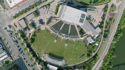 Rising spinning drone shot of Ascend Amphitheater in downtown Nashville Stock Footage 344049412