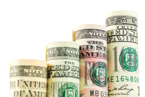 Rising steps made of rolls of four most valued american dollar banknotes Stock Photos