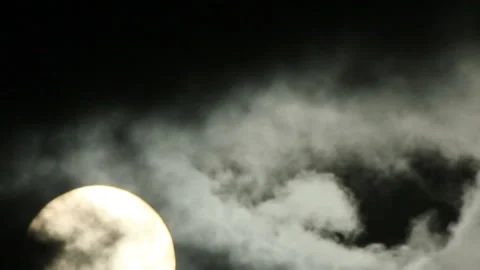 Rising sun in black clouds Stock Footage 125024330