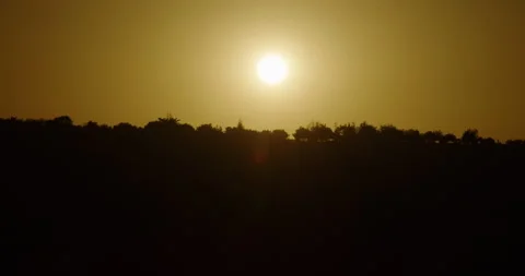 Rising sun shining over a hill in Cappadocia, Turkey Stock Footage 252004127