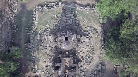 Rising up from temple ruins.  Stock Footage 128104632