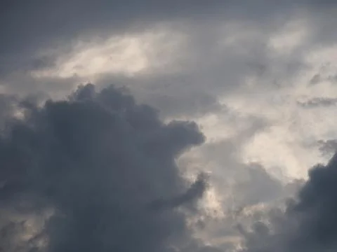 Rising thunderstorm with dark clouds in the sky Stock Photos