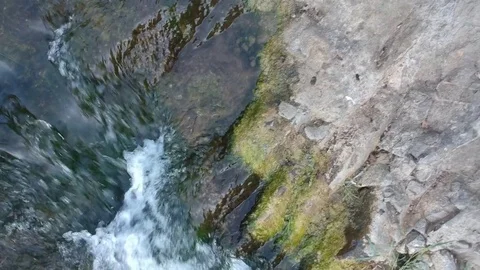 Rising Up From Top of Small Waterfall with Rotation Aerial Video stock 82469351
