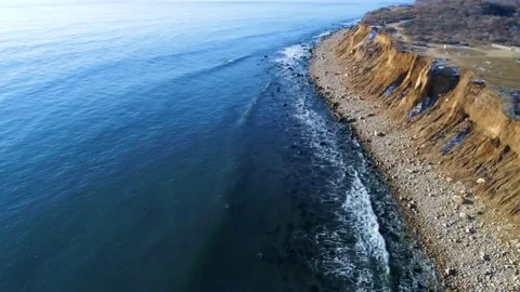 Rising tracking shot on cliff shore Stock Footage 155464516